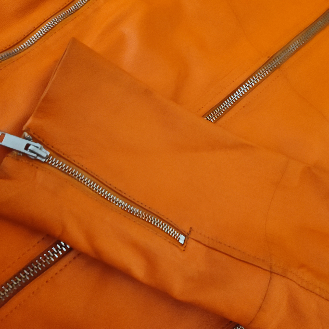 Leather-Jacket-Photo close-up-photo-of-orange-leather-jacket